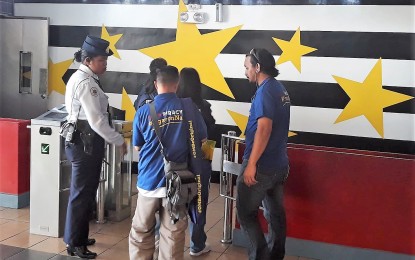 <p><strong>CINEMA MONITORING.</strong> Optical Media Board (OMB) agents inspect cinemas in Baguio City to intensify OMB's efforts in fighting piracy at its source, protecting locally-made films from being ‘cam-corded’. The inspection started Dec. 25, 2018 and will end on Jan. 7, 2019<em> (Photo by Pamela Mariz Geminiano)</em></p>