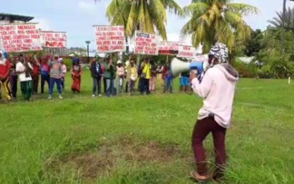 <p><strong>PROTEST.</strong> Members of the Indigenous Peoples communities in Sultan Kudarat hold at a lightning rally Wednesday (Dec.26) in Koronadal City denouncing the communist New People’s Army for duping the IPs on their futile cause. <em><strong>(Photo courtesy of the Manobo Dulangan IPs)</strong></em></p>