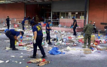 <p><strong>COTABATO EXPLOSION.</strong> Post-blast situation of Monday’s (Dec. 31) bombing at the façade of South Seas Mall in Cotabato City. <em><strong>(Photo courtesy of Army’s 6th ID)</strong></em></p>