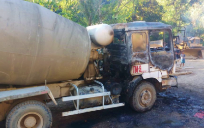 <p><strong>TORCHED.</strong> A burnt cement mixer in Barangay Hinalaan, Kalamansig, Sultan Kudarat on Monday (Jan. 7, 2018) after a torching spree carried out by suspected communist rebels. <em>(Photo courtesy of PRO-12)</em></p>