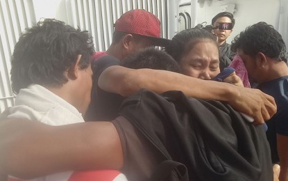 <p>Relatives emotionally welcome the three rescued fishermen upon arrival Thursday afternoon (January 10, 2019) at the port of Zamboanga. The Philippine Coast Guard rescued them drifting in Celebes Sea near the border of the Philippines and Indonesia. <em>(Photo courtesy of Ely E. Dumaboc)</em>  </p>