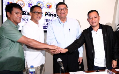 <p><strong>BATANG PINOY QUALIFYING HOSTS.</strong> The Philippine Sports Commission chairman William Ramirez has announced the hosts of the 2019 Batang Pinoy qualifying legs during a press conference at the PSC building on Friday (Jan. 11, 2019). From left are General Services Office Ricky Laggui of Ilagan City, Isabela; Provincial Sports and Youth Development Department head Giovanni Gulanes of Davao del Norte; and Iloilo City sports coordinator Moises Salomon. <em>(PNA photo by Jess Escaros)</em></p>