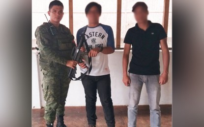 <p><strong>YIELDED.</strong> Two members of the ISIS-inspired Maute group surrendered to Lt. Col. Ian Ignes, Army's 55th Infantry Battalion commander in Pagawayan, Lanao del Sur on Friday (Jan. 11, 2019). <em>(Photo courtesy of Army’s 1st Infantry Division)</em></p>