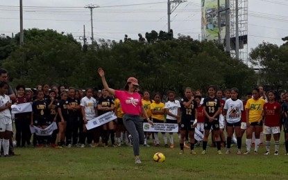<p>Deputy House Speaker Pia Cayetano leads the ceremonial kick to open the 4th Pinay in Action (PIA) All Women's Football Cup at the Tionko Football Field in Davao City on Saturday afternoon. <em><strong>PNA Photo by Lilian C Mellejor</strong></em></p>