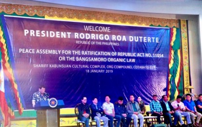 <p><strong>PEACE ASSEMBLY</strong>. President Rodrigo Duterte speaks before a peace gatheirng  for the raification of the Bangsamoro Organic Law in Cotabato City on Friday (Jan. 18), several days ahead of the scheduled Jan. 21 plebiscite for the proposed formation of the new Bangsamoro political entity. <em><strong>(Photo by PNA Cotabato)</strong></em></p>