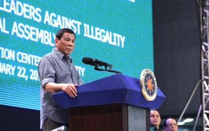 <p>President Rodrigo Roa Duterte delivers his speech during the annual assembly of the Provincial Union of Leaders Against Illegality (PULI) at the Quezon Convention Center in Lucena City, province of Quezon on Tuesday (Jan. 22, 2019.) (Photo courtesy of TOTO LOZANO/PRESIDENTIAL PHOTO)</p>
