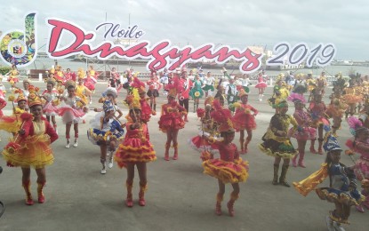 <p><strong>FESTIVAL BEGINS.</strong> The three-day highlights of the Iloilo Dinagyang Festival kicks off with the 'Tambor Trumpa Martsa Musika,' a drum  and bugle corps and lyre competition held at the Iloilo grandstand, Friday (Jan. 25, 2019).<em> (Photo by Perla Lena) </em></p>