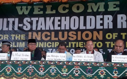 <p><strong>BARMM INCLUSION.</strong> Moro Islamic Liberation Front leaders call for the support of Lanao del Norte people for the inclusion of six municipalities in the province in the Bangasamoro Autonomous Region of Muslim Mindanao (BARMM) in Maigo town, Jan. 27, 2019. <em> (Photo by Divina Suson)</em></p>