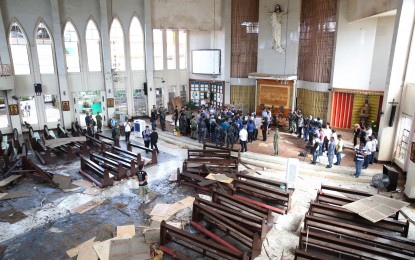<p>Two improvised explosive devices exploded one after the other at the Our Lady of Mount Carmel Cathedral in Barangay Walled City, Jolo, Sulu in January that left 18 people dead. <em>(PPD)</em>  </p>
