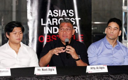 <p><strong>GO FOR GOLD.</strong> Pilipinas Obstacle Sports Federation (POSF) president Alberto Agra (center) talks about the medal chances of the national team in the 30th Southeast Asian Games during the launching of the Pretty Huge Obstacles (PHO), a world-class obstacle course training facility at the SM Aura Premier Civic Center in BGC, Taguig City on Friday (Feb. 1, 2019). <em>(PNA photo by Jess M. Escaros Jr.)</em></p>