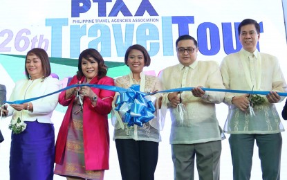<p><strong>TRAVEL TOUR EXPO</strong>. (From left to right) Davao Oriental 1st District Rep. Corazon Malangyaon, Travel Tour Expo 2019 chair Marlene Dado Jante, Senator Maria Lourdes "Nancy" Binay, Philippine Travel Agencies Association (PTAA) president Ritchie Tuaño, and Tourism Undersecretary Benito Bengzon Jr. lead the ribbon-cutting ceremony during the opening of the 26th Travel Tour Expo and PTAA Expanding Partnerships with International Counterparts at the SMX Convention Center in Pasay City on Thursday (Feb. 7, 2019). Eight national tourism organizations are participating in the expo, which aims to provide them the needed network to grow their operations. <em>(PNA photo by Avito C. Dalan)</em></p>