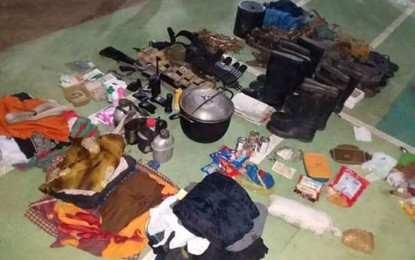 <p><strong>SEIZED BELONGINGS.</strong> Photo shows the M16 rifle with 11 magazines, an Anti-Personnel Mine, a rifle grenade, a commercial radio, personal belongings, and subversive documents recovered by the soldiers of the 15th Infantry Battalion based in Negros Oriental after an encounter in Sitio Baliw, Barangay Bagtic, Mabinay, Negros Oriental on Feb. 8, 2019. <em>(Photo contributed by Central Command - Information Office)</em></p>