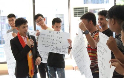 <p>Participants to the Baybayin writeshop show their finished output during the activity, which was led by the JCI-Lingayen Bagoong Chapter. <em>(Photo courtesy of JCI- Lingayen Bagoong Chapter's Facebook page)</em></p>