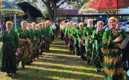 <p>Bangsamoro women in their colorful "Inaul" malong” (wraparound tube fabric) as they prepare for a parade during the "Inaul" festival. <em>(Photo courtesy of Maguindanao PIO)</em></p>