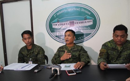 <p>Lt. Col. Sisenando Magbalot Jr (center), commanding officer of Philippine Army's 61IB, reveals on Wednesday (Feb. 13, 2019) a minor New People's Army member surrendered to government troops on Tuesday due to extreme hardships and hunger in the mountains. <em>(Photo by Ma. Leonora Estanque) </em></p>