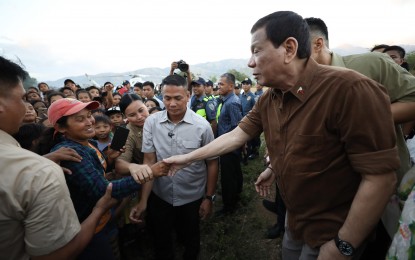 <p><strong>NO TOUCH POLICY.</strong> President Rodrigo Duterte shakes hands with the crowd in one of the events he attended. The Presidential Security Group will be implementing a “no-touch” policy on Duterte and the first family to prevent them from contracting the coronavirus disease. <em>(Presidential photo)</em></p>