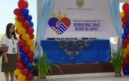 <p><strong>NEW LOGO, SLOGAN.</strong> Bureau of Internal Revenue-Revenue Region 12 Director Aynie Mandajoyan-Dizon (left) leads the launching of the agency’s 2019 tax collection campaign logo and slogan at the regional office’s Function Hall in Bacolod City on Monday, Feb. 18, 2019. (Contributed photo)</p>
<p> </p>