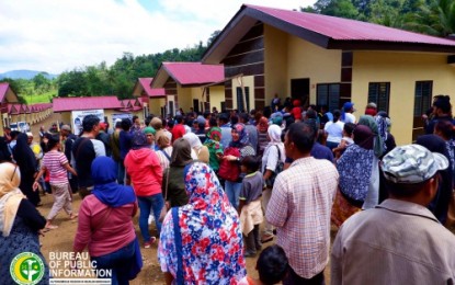 <p><strong>NEW HOUSES.</strong> A total of 100  families displaed in the 2017 Marawi siege troop to their new houses after the turn-over ceremony led by the Autonomous Region in Muslim Mindanao-Bangsamoro Regional Inclusive Development for Growth and Empowerment program on Tuesday (Feb. 19). <em><strong>(Photo by BPI-ARMM)</strong></em></p>