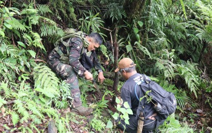<p><strong>MILITARY'S OUTREACH PROGRAM.</strong> Soldiers of the Philippine Army’s 93<sup>rd</sup> Infantry Battalion join a tree-planting activity in a upland village in Ormoc City. Participating in outreach programs is seen as one of the strategies to combat insurgency. <em>(Photo courtesy of Army 93rd IB) </em></p>