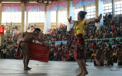 <p>Performers from the seven towns and one city in Kalinga vie for the best performance award of the 'digdiga ni tupayya' (courtship dance) during the 24th foundation day and 3rd Bodong festival in the province. <em>(Photo courtesy of Jamie Joie Malingan/PIA-CAR)</em></p>