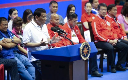 <p>President Rodrigo Roa Duterte delivers his speech during the Partido Demokratiko Pilipino-Lakas ng Bayan (PDP-LABAN) campaign rally at the Alonte Sports Arena in Biñan City, Laguna on February 23, 2019. <em>(Simeon Celi Jr./Presidential Photo)</em></p>