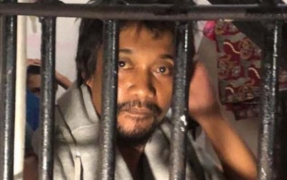 <p>Rajiv Abubakar, 34, who claims to be a member of the Moro Islamic Liberation Front (MILF), was arrested early Monday by policemen in an anti-drug operation in Barangay Mampang, Zamboanga City. <em>(Photo by Ely E. Dumaboc)</em> </p>