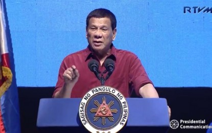 <p><strong>STERN WARNING.</strong> President Rodrigo R. Duterte gives a stern warning that he will make sure the remaining three years of his term would be the "most dangerous years" for drug personalities in the country, during a PDP-Laban sortie in Cebu City on Sunday, Feb. 24, 2019. <em>(Videograb from RTVM)</em></p>