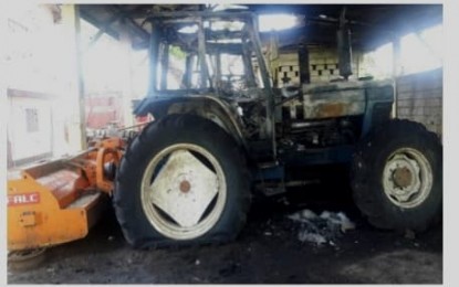 <p><strong>BURNED.</strong> A tractor that was among several heavy equipment torched allegedly by New People’s Army members at a farm in Manjuyod, Negros Oriental on Monday, Feb. 25, 2019. <em>(Photo courtesy of PNP)</em></p>