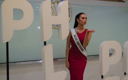 <p>Miss Universe 2018 Catriona Gray faces the media after her meeting with Tourism Secretary Bernadette Romulo-Puyat at the DOT office in Makati City. <em>(Photo by Joyce Ann L. Rocamora)</em></p>