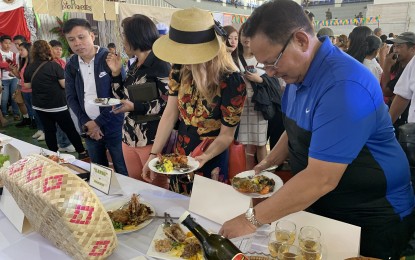 <p><strong>CEZA CULINARY FEST.</strong> Cagayan Economic Zone Authority administrator Raul Lambino and other guests partake various dishes during the 1st CEZA Culinary Challenge at the Sta. Ana Gymnasium in Sta. Ana, Cagayan on Monday, Feb. 25, 2019. <em>(Villamor Visaya Jr.)</em></p>