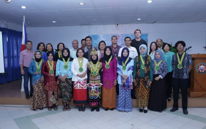 <p>At least 10 students from five Indonesian universities (front row) pose for a souvenir shot with several MMSU faculty members at the start of their SEA-TVET Student Internship Exchange program at MMSU. <em>(Photo by Marco Leo A. Magno, MMSU StratCom)</em></p>