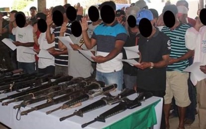 <p><strong>OATH OF ALLEGIANCE.</strong> The 25 former fighters of the New People’s Army in Negros Occidental  take an oath of allegiance to the Philippine government after they surrendered to officials of the Philippine Army and the Philippine National Police in Sagay City last March 2. <em>(Photo courtesy of 79<sup>th</sup> Infantry Battalion, Philippine Army)</em></p>