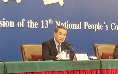 <p>Chinese State Councilor and Foreign Minister Wang Yi holds a press conference at the Beijing Media Center on Friday (March 8, 2019). <em><strong>(PNA photo by Kris Crismundo)</strong></em></p>
