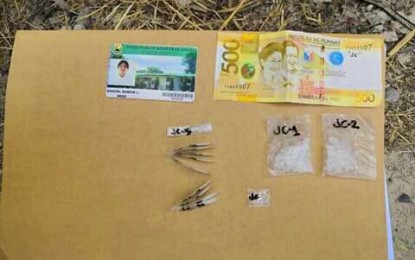 <p><strong>SEIZED SHABU.</strong> The illegal shabu drug items, PHP500 marked money, and identification document confiscated from drug suspect Eurick Quizon in Kidapawan City on Sunday (March 10). <em><strong>(Photo courtesy of PRO-12)</strong></em></p>