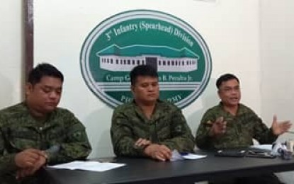 <p>Lt. Col. Sisenado Magbalot Jr., commanding officer of the Philippine Army’s 61st Infantry Battalion (extreme left), on Thursday (March 14, 2019) says the reaffirmation of loyalty of the 49 rebel supporters is the result of the efforts of the Community Support Program teams, among others.<em> (Photo by Gail Momblan)</em></p>