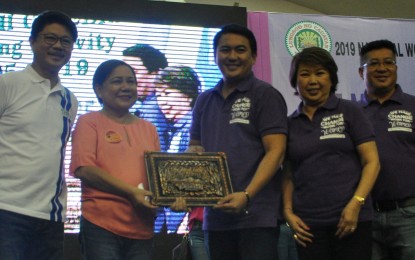 <p><strong>WOMEN'S MONTH.</strong> Senator Cynthia Villar receives a plaque of appreciation from City Mayor Bernard Faustino Dy for being guest speaker at the International Women's Month celebration in Cauayan City, Isabela on Friday, March 15, 2019. With her are Isabela Governor Faustino Dy III, Regional Development Council vice-chairperson Cecille Dy and Cauayan City Vice Mayor Leoncio Dalin Jr. <em>(Photo by Villamor Visaya Jr.)</em></p>