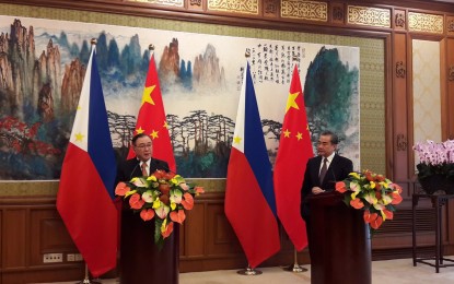 <p>Foreign Affairs Secretary Teodoro Locsin Jr. at a joint press briefing with Chinese State Councilor and Foreign Minister Wang Yi in his first official visit to Beijing.<em> (Photo courtesy of DFA-Office of Public Diplomacy/ Emilio Lopue)</em></p>