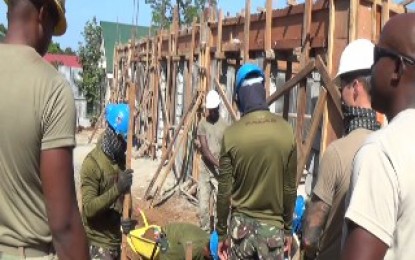 <p><strong>JOINT FORCES.</strong> Filipino and American soldiers are jointly  constructing a school building in an upland village in Orani, Bataan under the Philippine-US Balikatan Exercise. <em>(Photo by Ernie Esconde)</em></p>
