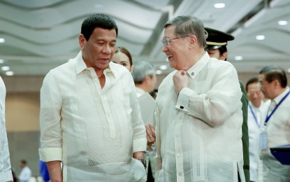 <p>President Rodrigo Duterte and Department of Finance Secretary Carlos Dominguez III <em>(Presidential photo)</em></p>