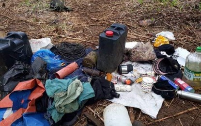 <p>Photo shows the recovered explosive devices and personal items from the New People's Army following a clash with governemnt troopers in Baguio District, Davao City. <em><strong>(Photo courtesy of the Eastmincom PIO)</strong></em></p>