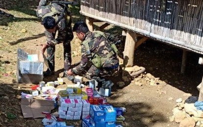 <p>Troopers of the Philippine Army’s 79<sup>th</sup> Infantry Battalion check several boxes of medicines amounting to almost PHP300,000 recovered by their team after an encounter with the New People’s Army rebels in Barangay Mabini, Escalante City, Negros Occidental on the night of March 21. <em>(Photo courtesy of 79<sup>th</sup> Infantry Battalion, Philippine Army)</em></p>
<p> </p>