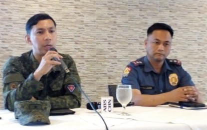 <p>Brig. Gen. Benedict Arevalo (left), commander of Philippine Army's 303<sup>rd</sup> Infantry Brigade, with Lt. Col. Adrian Acollador, deputy director for administration of Negros Occidental Police Provincial Office, discusses in a press briefing in Bacolod City on Wednesday  (March 27, 2019) the operations conducted by the military that eventually led to the arrest of top Negros communist rebel leader Francisco 'Frank' Fernandez in Laguna on Sunday. <em>(Photo by Nanette L. Guadalquiver)</em></p>
<p><em> </em></p>