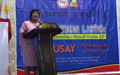 <p><strong>OPERATION L!STO.</strong> Department of the Interior and Local Government (DILG) Regional Director Julie J. Daquioag delivers her message during the regional launching of the Operation L!sto Disaster Preparedness Manual Version 3.0. The event was held at the Kingsborough International Convention Center in the City of San Fernando, Pampanga on March 28, 2019. <em>(Photo courtesy of DILG Region 3)</em></p>