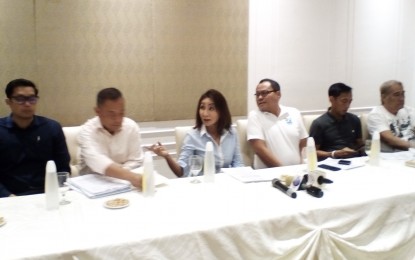 <p><strong>INJUNCTION CASE.</strong> Cebu Rep. Gwendolyn Garcia stresses a point in the case she filed against Governor Hilario Davide III involving a PHP1.5-billion building project inside the Capitol compound. With her is younger brother, former congressman Pablo John Garcia (third from right), at the press conference on March 28, 2019. <em>(Photo by Luel Galarpe)</em></p>