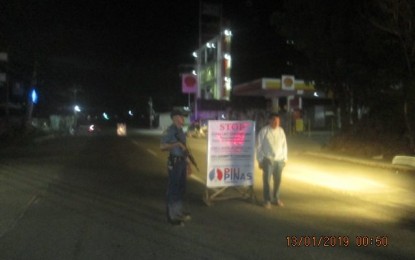 <p> </p>
<p><strong>ELECTION CHECKPOINT.</strong> Officers of Commission on Elections in Iloilo and the Miagao police conduct a poll checkpoint operation in Barangay Igtuba, Miagao, Iloilo. Miagao is one of the nine towns in the province placed under ‘category orange’ because of the recent armed encounters between the Army and the rebels. An area is placed under category orange when there are monitored presence and existence of rebel groups, said Iloilo Police Provincial Office Col. Marlon Tayaba on Thursday (March 28, 2019).  <em>(Photo courtesy of Miagao PNP)</em></p>
<p><em> </em></p>
<p> </p>