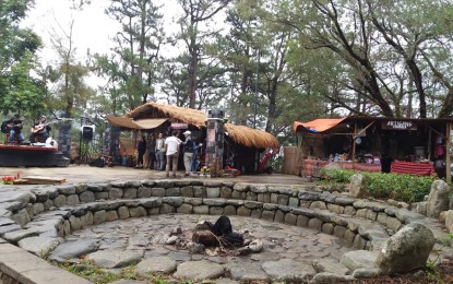 <p>The traditional ‘Dap-ay’ where the Cordillera men in the olden times sit to discuss issues and solve problems of the community. It stands on the center of the ‘Ili-ay Cordillera’- a depiction of how the Cordillerans live. <em>(Photo by Liza T. Agoot/PNA)</em></p>