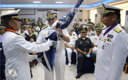 <p class="p1"><strong>NEW NAVFORCEN CHIEF.</strong> Philippine Navy Acting Flag Officer in Command, Rear Admiral Rommel Jude G. Ong (center), hands over the Naval Forces Central (Navforcen) command flag to Commodore Dorvin Jose L. Legaspi (right), who replaced Commodore Loumer P. Bernabe as Navforcen commander, in a change of command ceremony on March 29, 2019, at the Naval Base Rafael Ramos, Barangay Looc, Lapu-Lapu City. The Naval Forces Central supervises all naval operations in the three regions in the Visayas. <em>(Photo by Naval Forces Central PAO) </em></p>