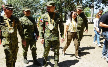 <p><strong>RESERVISTS COMMANDER.</strong>  Senator Emmanuel 'Manny' Pacquiao (center), who holds the rank of colonel in the Army Reserve Command, assumes Monday (April 1, 2019) as commander of the ready reserve force in central Mindanano. The senator said he will pursue programs that would help build the capability of some 3,000 reservists in the area. <em>(Photo courtesy of Isagani Palma/Malungon Information Office)</em></p>