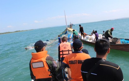 <p>Personnel of the Philippine Coast Guard during a rescue operation. <em>(File photo)</em></p>