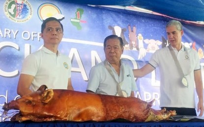 <p>Negros Occidental Governor Alfredo Marañon Jr. (center) and Vice Governor Eugenio Jose Lacson (right) join Provincial Veterinarian Renante Decena during the Lechonaad, a parade of lechon (roasted pigs), at the Livestock and Dairy Fair, which opened Monday morning as one of the events of the 26<sup>th</sup> Panaad sa Negros Festival set from April 8 to 14 at the Panaad Park and Stadium in Bacolod City. <em>(Photo courtesy of Negros Occidental Capitol PIO)</em></p>